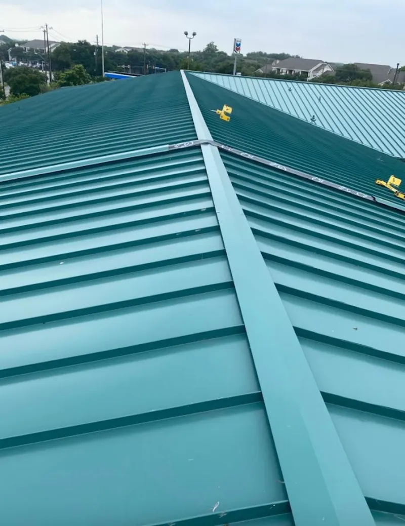 Green commercial metal roof ridge and valley for Metal Roof Repair in Monett