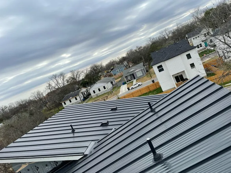 Standing seam metal roof panels with vents for Skylight Repair in Monett